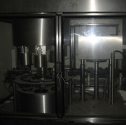 Автомат для нанесения и усадки термоусадочного колпачка